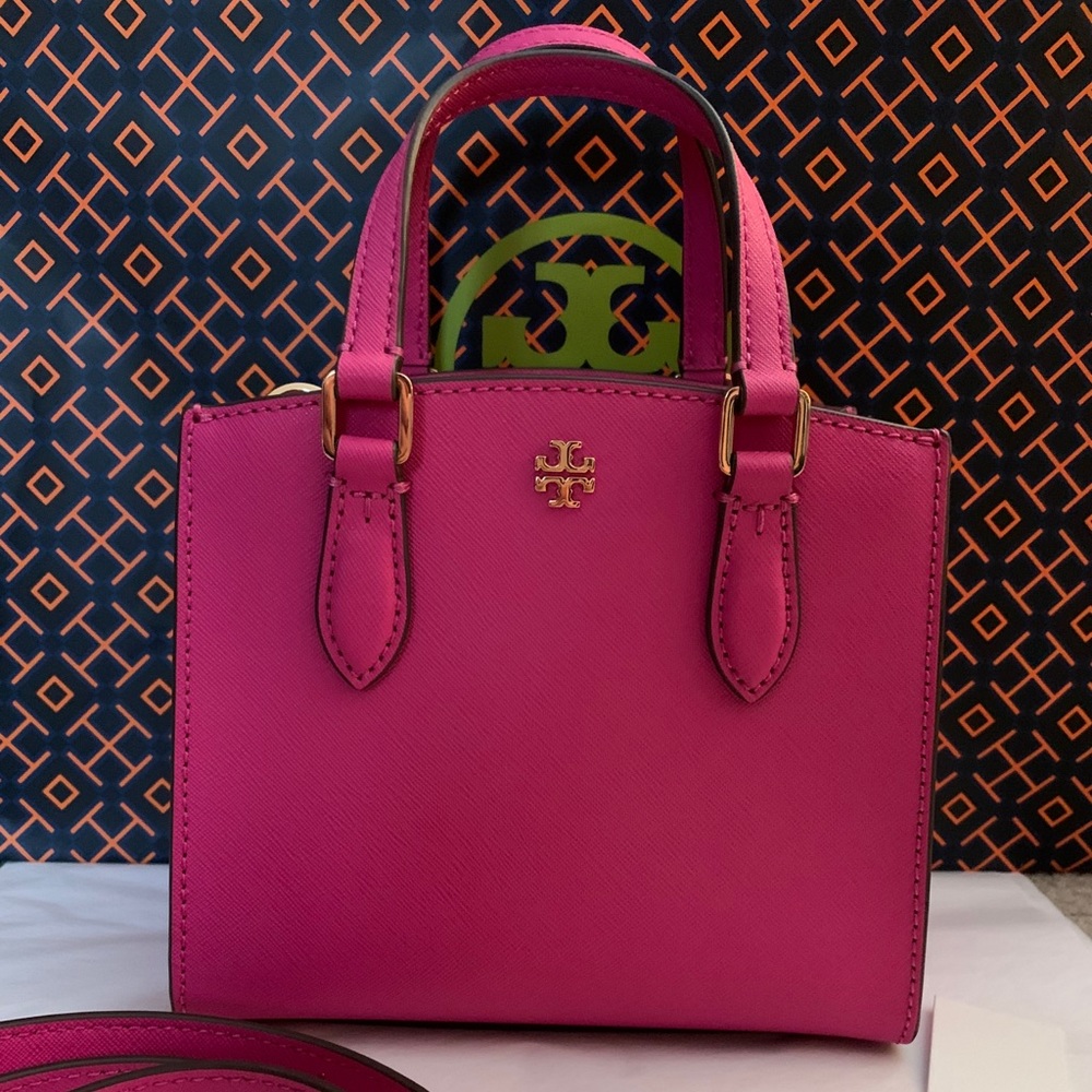 Tory Burch (it’s a small crossbody) perfect for phone&lipstick for a night out🥰